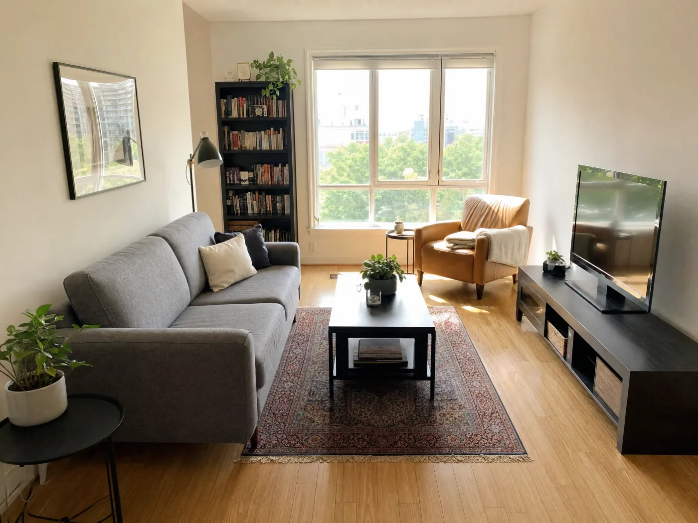 The same living room with the same furniture rearranged into an open, balanced layout