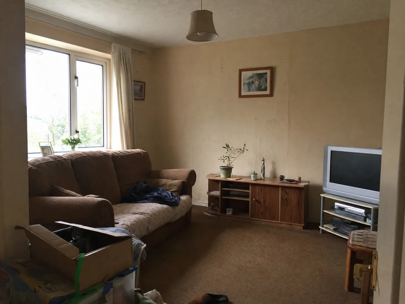 Dull, dated living room before redesign